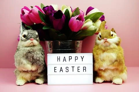 Happy Easter light box with easter element decoration on pink background Stock Photos