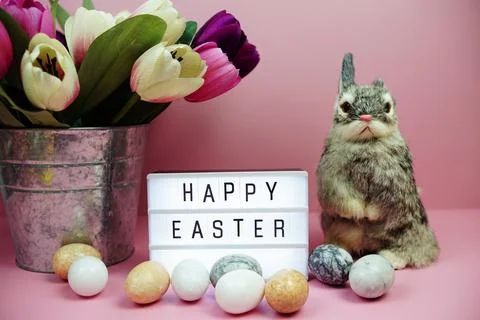 Happy Easter light box with easter element decoration on pink background Stock Photos