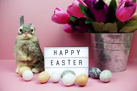Happy Easter light box with easter element decoration on pink background Stock Photos