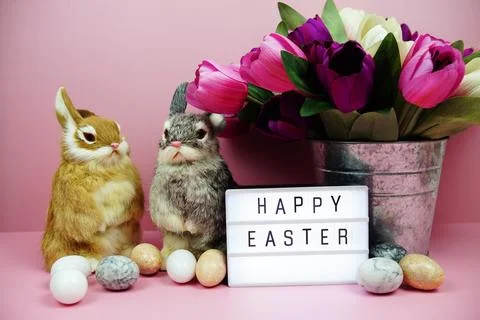 Happy Easter light box with easter element decoration on pink background Stock Photos