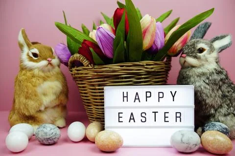 Happy Easter light box with easter element decoration on pink background Stock Photos