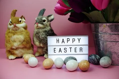 Happy Easter light box with easter element decoration on pink background Stock Photos