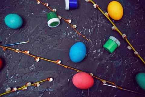 Happy Easter. Painted multi-colored eggs. Flowering willow fur seal, on an ab Stock Photos