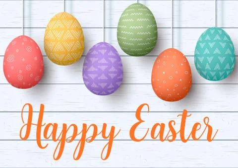 Happy Easter. pending easter eggs on white wooden background. Easter colorful イラスト素材