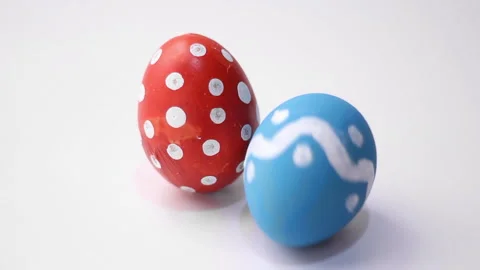 Happy easter. Red chicken egg with pattern of white polka dots Stock Footage 258878036