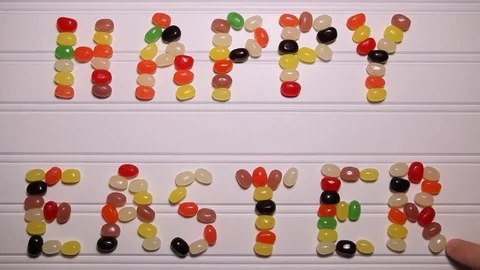 Happy Easter Spelled with Jellybeans Stock Footage 73206758