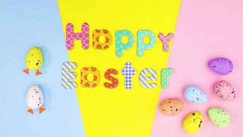 Happy Easter stop motion moving eggs and text on pastel theme 스톡 동영상 149250365