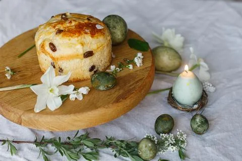 Happy Easter! Stylish dyed eggs, easter cake on wooden stand, spring flower.. Stock Photos