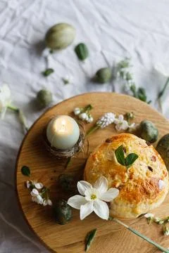 Happy Easter! Stylish dyed eggs, easter cake on wooden stand, spring flower.. Stock Photos