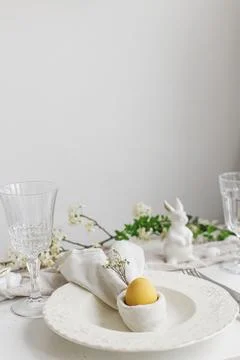 Happy Easter! Stylish elegant Easter brunch table setting Stock Photos