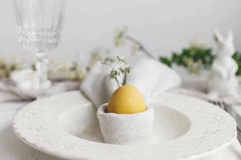 Happy Easter! Stylish elegant Easter brunch table setting Stock Photos