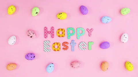 Happy Easter text appear between colorful eggs. Stop motion 動画素材 148190553