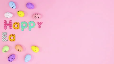 Happy Easter text appear with eggs on pastel pink theme. Stop motion 스톡 동영상 148189477