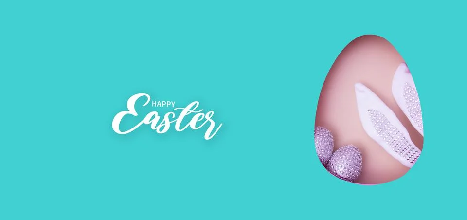 Happy Easter text with Easter egg cut out of paper and chocolate mini eggs... Stock Photos