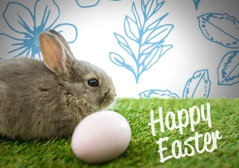Happy Easter text with Easter rabbit with egg in front of pattern Stock Photos