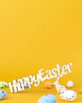 Happy easter text, greeting card background. Spring holiday decorations and c Stock Photos