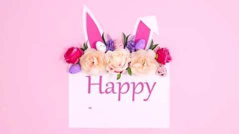 Happy Easter text write on paper with bloom and bunny ears. Stop motion Stock-Footage 150069071