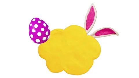 Happy Easter title in Clay. Title plate and eggs. Alpha matte. 4K Stock Footage 72845181