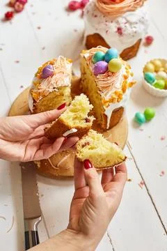 Happy Easter, Woman cut Easter cake for the holiday Stock Photos