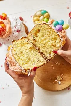 Happy Easter, Woman cut Easter cake for the holiday Stock Photos