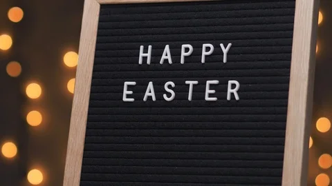 HAPPY EASTER Words On A Black Letter Board Message Sign Stock Footage 105087031