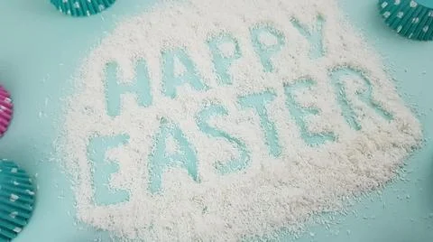 Happy Easter is written on a light blue background. according to Pantone, cup Stock Photos