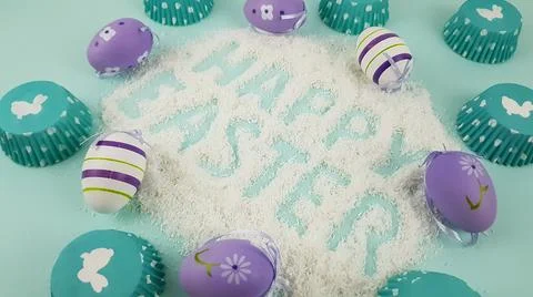 Happy Easter is written on a light blue background. according to Pantone, cup Stock Photos