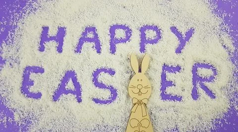 Happy Easter is written on a purple background according to Pantone trending  Stock Photos