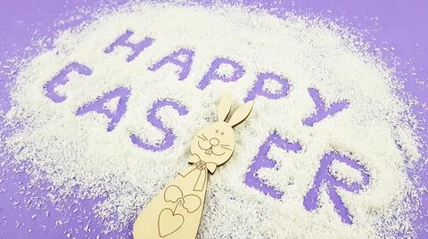 Happy Easter is written on a purple background according to Pantone trending  Stock Photos