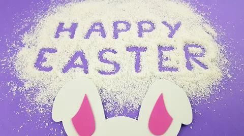 Happy Easter is written on a purple background according to Pantone trending  Stock Photos