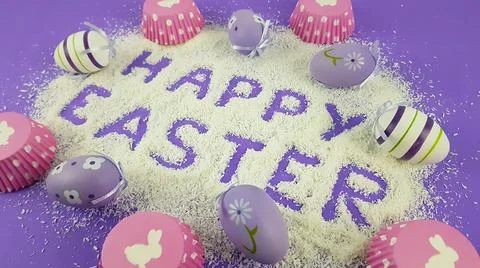 Happy Easter is written on a purple lilac background. according to Pantone, t Stock Photos