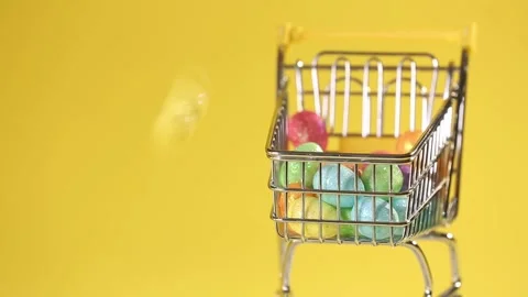 Happy easter.Colorful Easter eggs fall on a yellow background. Easter background Stock Footage 234216681