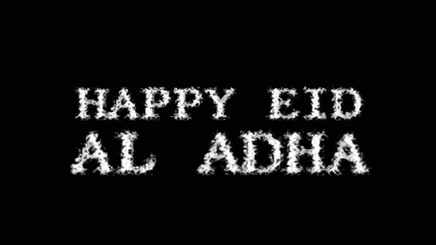 Happy Eid Al Adha cloud text effect black isolated background Stock Footage 139642123