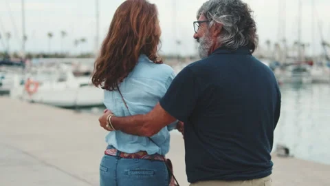 Happy elderly couple dancing in the port Stock Footage 254914717