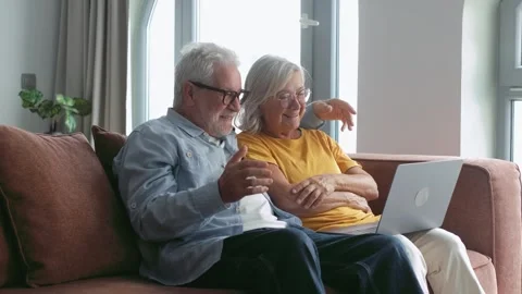 Happy Elderly Couple Enjoys a Stock Footage 332684836