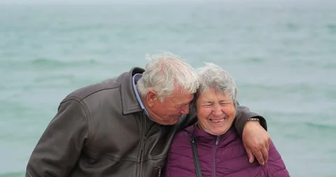 Happy elderly couple having fun and laughing to camera Stock Footage 318182477