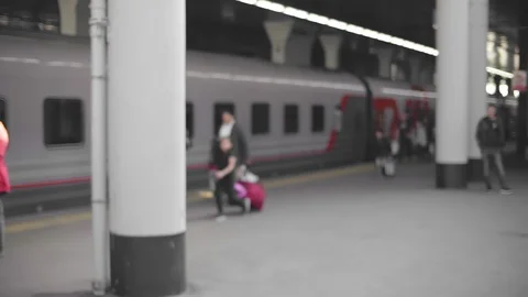 Happy elderly couple hugging in a train station after arrival Stock Footage 123312885