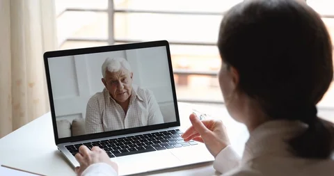 Happy elderly father video calling young... | Stock Video