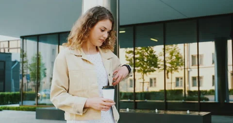 Happy emotions from receiving good message or news, girl smiles and laughs Stock-Footage 132556765