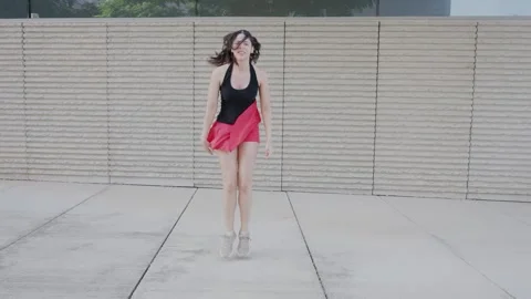 Happy energetic dancer spinning in slow motion Stockbeeldmateriaal 343992707