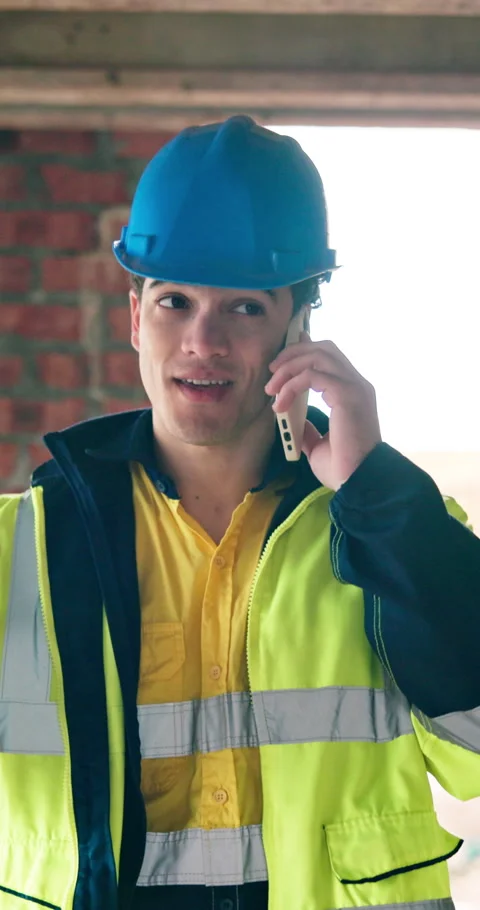 Happy, engineer and phone call at site for construction, inspection and Stock Footage 340873651