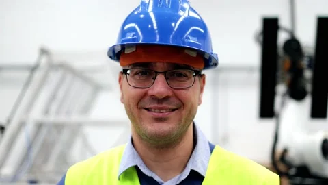 Happy engineer man working at ai robotic automation warehouse - Industrial techn Stock Footage 229640141