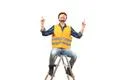 The happy engineer sitting on the ladder on the white background Photo