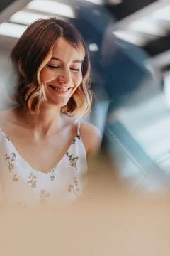 Happy Entrepreneur Solving Problems and Analyzing Statistics in Modern Office Stock Photos