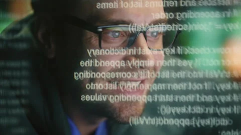 Happy expert creating code at data hologram closeup. Developer man programming Stock Footage 260243160