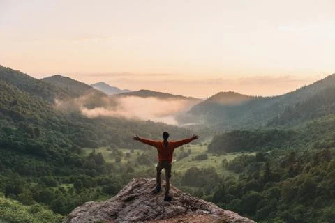 Happy explorer in mountains Stock Photos