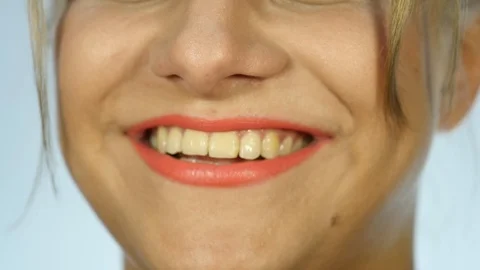 Happy expression on a woman's face with smile. close up of a lips. slow motion Stock Footage 88792390