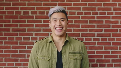 Happy, face and asian man for education, learning and college with artistic Stock Footage 334759719