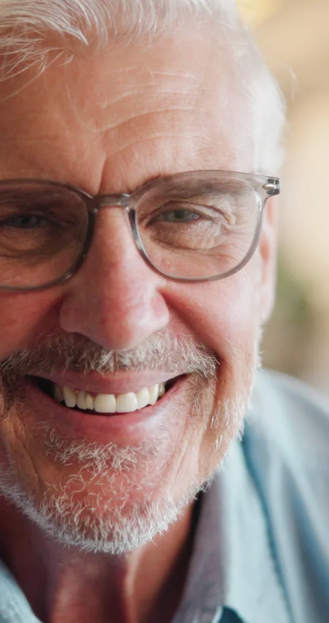 Happy, face and elderly man in home for relax, chill and enjoy weekend in living Stock Footage 335942729