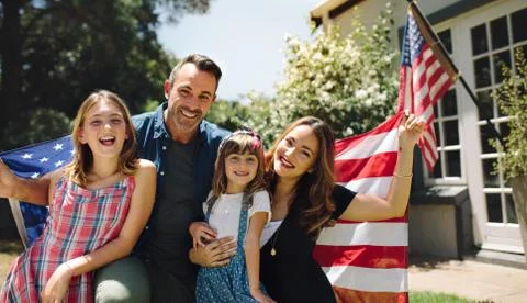 Happy family celebrating the american independence day Stock Photos